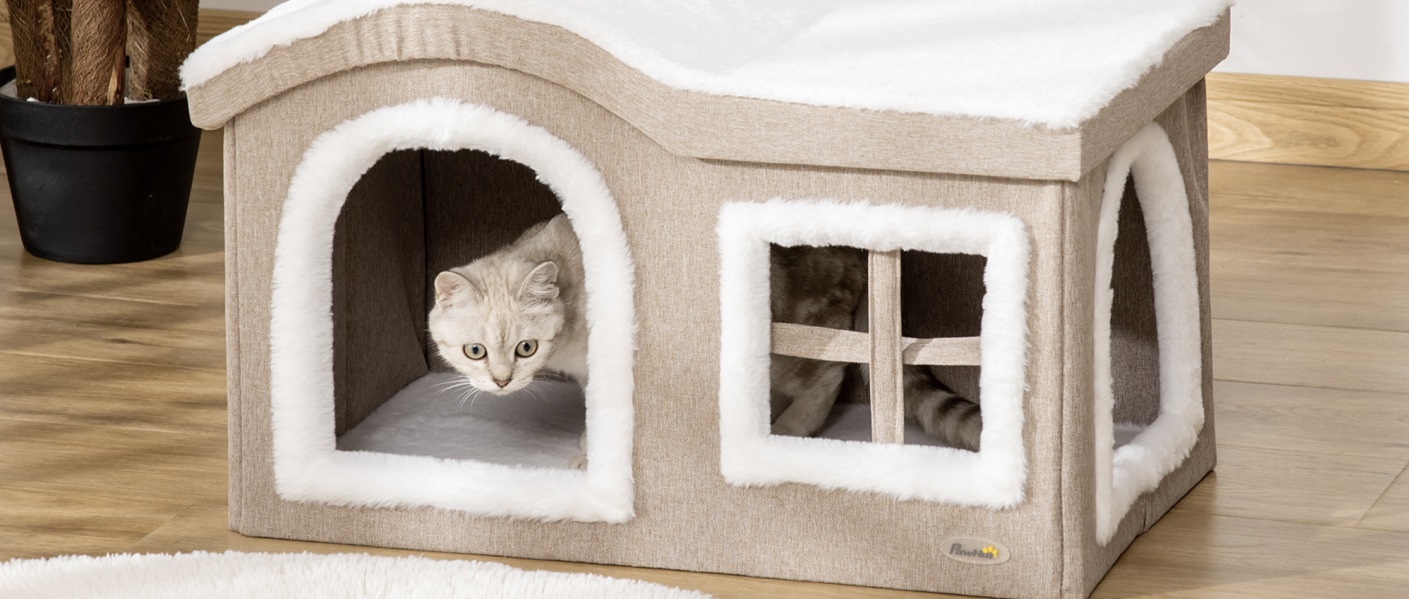 casa para gato dobrável na cor branca com bege e um gato dentro